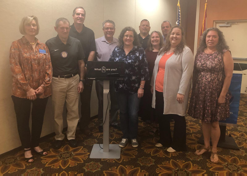Club donation to Safe to Sleep of phone battery charging station